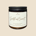 Load image into Gallery viewer, Candle jar labeled 'Santal and Coconut' by Alume on a white background