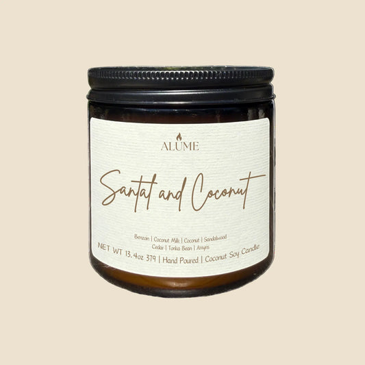 Candle jar labeled 'Santal and Coconut' by Alume on a white background